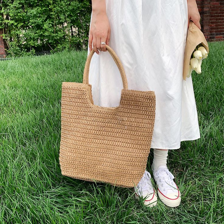 Elevate Your Summer Style with Our Handmade Straw Shoulder Bag Add a touch of bohemian flair to your summer wardrobe with our Stylish Straw Woven Shoulder Bag. Handcrafted from high-quality straw, this chic handbag is perfect for sunny days at the beach, leisurely strolls, and stylish shopping trips. Its solid color design and spacious interior make it a versatile accessory that complements any outfit. Product Features High-Quality Material: Made from durable straw, our shoulder bag is lightweig Casual Handheld Straw Bag Made Of Jute, Trendy Braided Bag For Vacation, Trendy Beige Crochet Bag For Beach, Trendy Beige Crochet Beach Bag, Trendy Rattan Straw Bag For Daily Use, Trendy Braided Shoulder Bag For Vacation, Casual Beige Crochet Bag For Summer, Casual Jute Straw Handheld Bag, Casual Handheld Jute Straw Bag