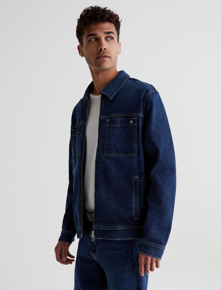 The Vann Jacket is a reimagined trucker in a relaxed fit with a dark wash, zip-up styling, and long, roomy sleeves. It's detailed by square patch pockets at the chest and side welt pockets. Part of our Circular Denim initiative from The Jean of Tomorrow™ collection, Vann comes in 12.5 oz. Revival Denim made from recycled AG jeans. The fabric features a soft cotton blend with a bit of stretch for added comfort.Revival Denim, 12.5 oz. 64% Cotton 34% Lyocell, 2% Elastane Ag Jeans, Up Styles, Welt Pockets, Welt Pocket, Zip Up, Patch Pocket, Zip Ups, Cotton Blend, Relaxed Fit