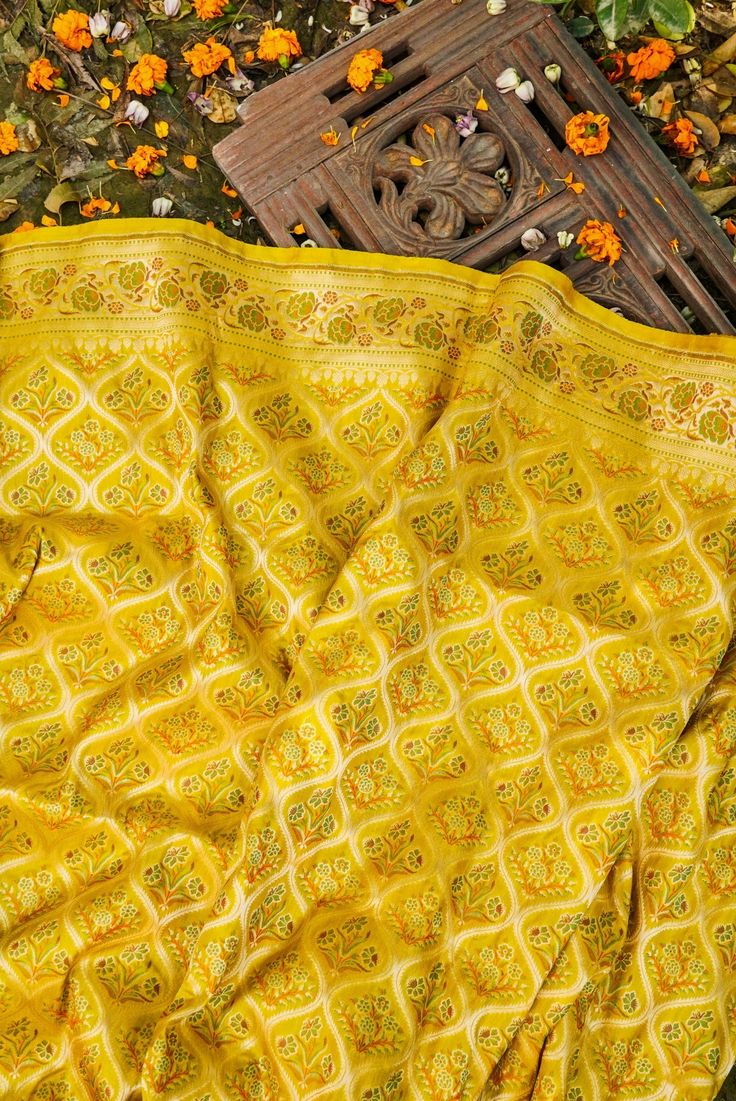 Khinkhwab's Katan Silk saree epitomizes timeless grace and luxury. Meticulously crafted with pure silk, the fabric boasts a smooth and lustrous texture, highlighting the traditional Katan weave known for its fine and tight pattern. This saree offers an elegant drape and a luxurious feel against the skin. Khinkhwab's Katan Silk saree is a fusion of heritage and modern sophistication. Each piece tells a story of craftsmanship and attention to detail, making it a symbol of refinement. Experience the richness of tradition and elegance in every fold with Khinkhwab's Katan Silk saree. Traditional Jamawar Silk Scarf With Patterns, Luxury Dupatta With Traditional Patterns And Drape, Elegant Katan Silk Pashmina Shawl For Festivals, Luxury Dupatta With Traditional Drape, Luxury Silk Saree In Traditional Drape, Luxury Silk Saree With Traditional Drape, Gold Silk Pre-draped Saree For Traditional Ceremonies, Traditional Silk Scarf For Wedding And Eid, Elegant Banarasi Silk Pashmina Shawl With Pallu