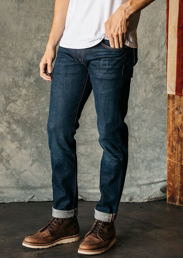 Slim fit Indigo Washed 14 oz What is denim weights? 96% COTTON/4% POLYURETHANE Made in USA 4-Way stretch selvedge denim Model is 6'2" and wearing a size 32. Our premium denim is inspired by the classic vintage blue jean. Our Premium Japanese 4-Way Stretch Selvedge denim story starts in Japan where our fabric is developed at one of the oldest denim mills. We blend a unique 4 way stretch material with selvedge denim to create a specific amount of stretch and comfort you wouldn’t typically get with Japanese Selvedge Denim, Men Closet, Raw Jeans, Retro Brand, The Pen, Selvedge Denim, Best Jeans, Premium Denim, Blue Jean