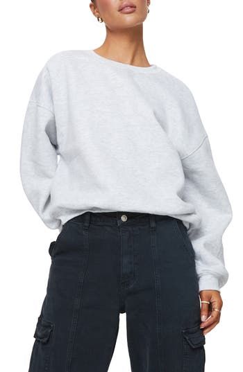 This cozy cotton-kissed sweatshirt is designed in a slouchy silhouette with dropped shoulders. Crewneck Dropped shoulders Ribbed cuffs and hem 65% polyester, 35% cotton Machine wash, dry flat Imported Casual Boxy Sweater With Ribbed Cuffs, Casual Sweater With Ribbed Cuffs And Boxy Fit, Casual Sweatshirt With Ribbed Cuffs And Drop Shoulder, Relaxed Fit Sweater With Ribbed Waistband, Trendy Relaxed Fit Sweatshirt With Ribbed Neckline, Trendy Sweatshirt With Ribbed Neckline And Relaxed Fit, French Terry Everyday Sweatshirt, Everyday French Terry Sweatshirt, Relaxed Fit Cotton Sweatshirt With Ribbed Waistband