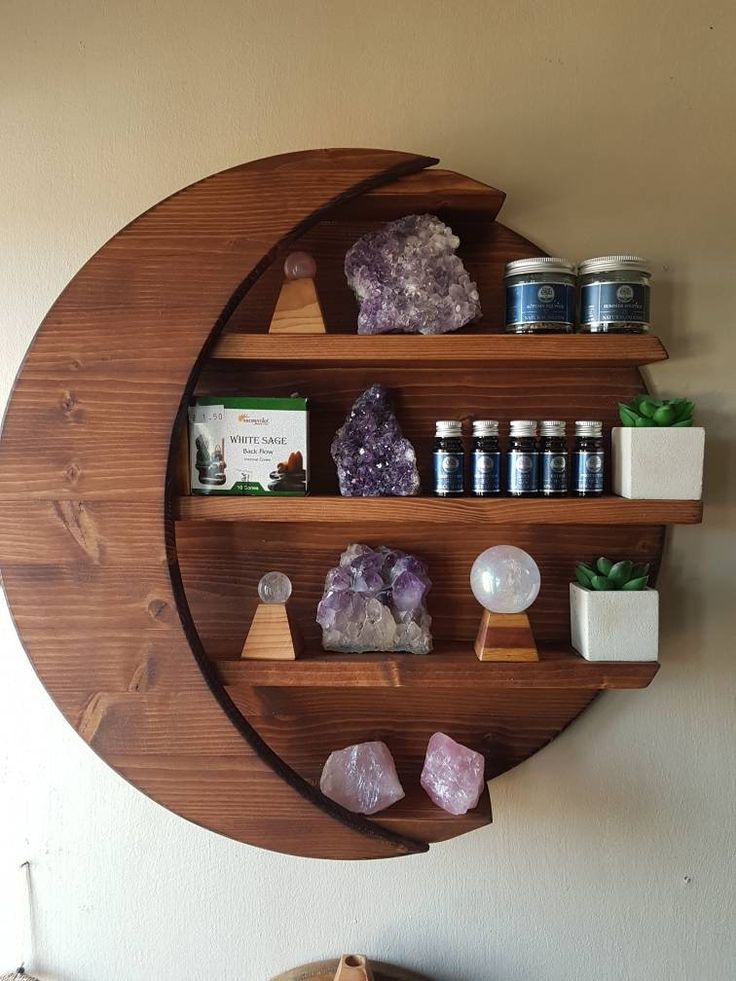 a shelf that has some rocks on it and other items in front of the shelves