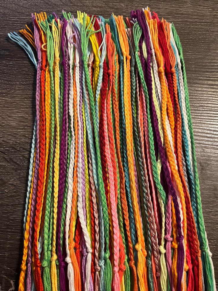 BRAIDS! Pack of 5 colorful braids Great for work events, team events, special occasions such as birthdays, parties, clubs, school teams, endless reasons. Each pack will contain 5 random colored braids. If you need specific colors, get in touch These make great gifts for loved ones as they can be added to existing stacks or be used to build a new one.