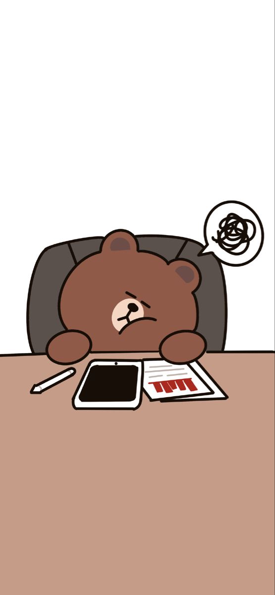 a brown teddy bear laying on top of a table next to a tablet computer and calculator