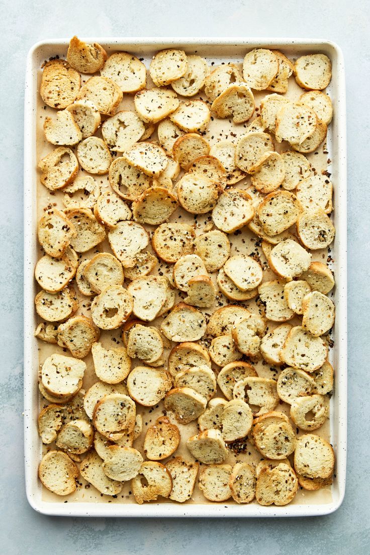 baked potato chips in a white baking dish