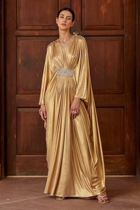 Buy Gold Lycra Embellished Glass Bead V Neck Zahra Front Draped Kaftan For Women by Dania Siddiqui Online at Aza Fashions. Draped Kaftan, Gold Drapes, Kaftan For Women, Kaftan Designs, Crystal Embroidery, Embellished Neckline, Beaded Neckline, Evening Dresses Elegant, Kaftan Dress