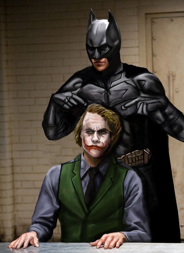 the joker and batman are standing next to each other