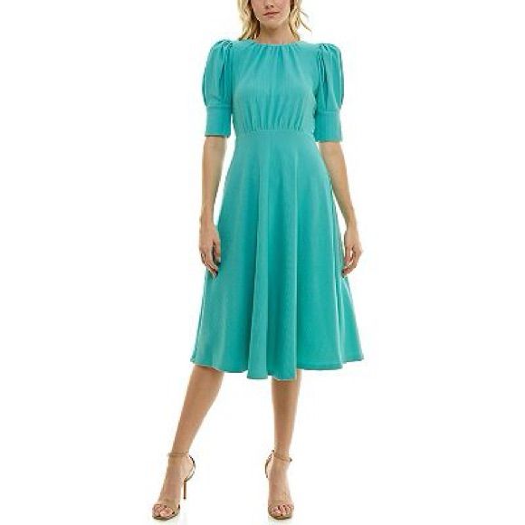 Stretch A-line Brunch Dress, Blue Mid-length Ruched Dress, Blue Stretch Mid-length Dress, Solid Knee-length Dress For Daywear, Knee-length Dress For Daywear, Fitted Green Midi Puff Sleeve Dress, Green Fitted Puff Sleeve Midi Dress, Fitted Mid-length Ruched Puff Sleeve Dress, Modest Knee-length Stretch Midi Dress