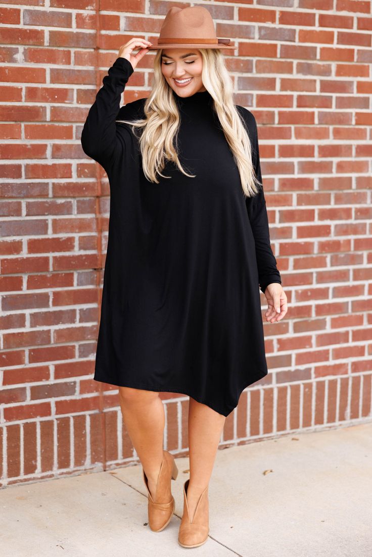 Look chic and modern with this gorgeous dress! The asymmetrical design is stylish while the classic black color adds a touch of sophistication! Crafted for comfort, it offers a figure-flattering fit that can be dressed up or down and is perfect for any occasion! 95% Rayon, 5% Spandex Black Solid Color Midi Dress For Date Night, Fall Mini Dress For Workwear With Asymmetrical Hem, Black Long Sleeve Asymmetrical Dress For Spring, Asymmetrical Solid Midi Dress For Date Night, Chic Asymmetrical Dress In Solid Color, Chic Asymmetrical Solid Color Dress, Casual Black Dress With Asymmetrical Neckline, Asymmetrical Hem Midi Dress For Date Night, Solid Asymmetrical Dresses For Fall