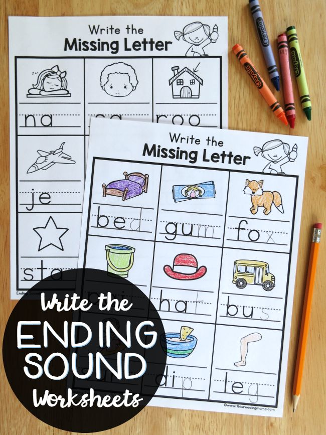 the missing letter worksheet is next to some crayons