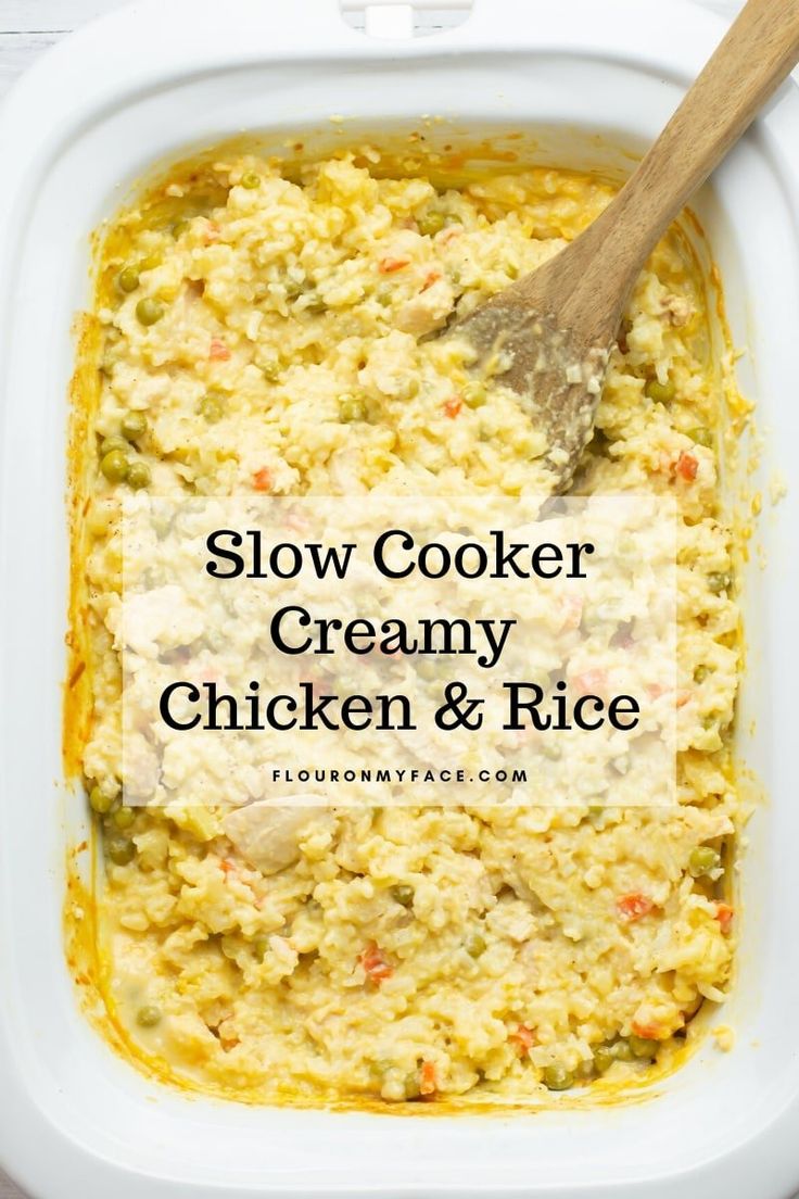 slow cooker creamy chicken and rice in a white casserole dish