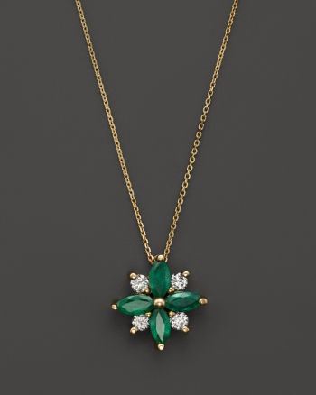 A charming flower pendant necklace with emeralds and diamonds in 14K yellow gold. Girlfriend Necklace Gift, Floating Diamond Necklace, Diamond Flower Pendant, Diamond Heart Pendant Necklace, Dainty Diamond Necklace, Diamond Solitaire Necklace, Dainty Gold Necklace, Flower Pendant Necklace, Exclusive Jewelry