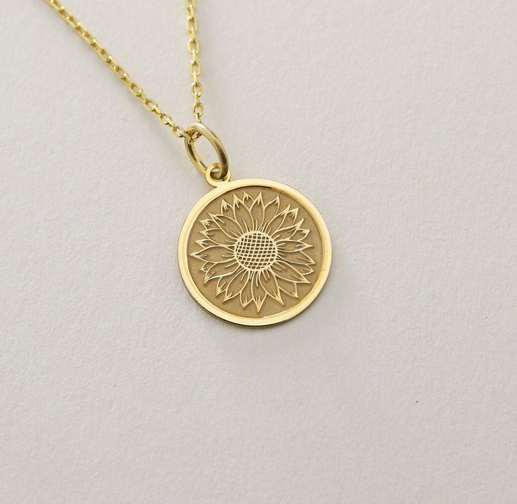 14K Real Solid Gold Sunflower  necklace ● Material of pendant: Solid Gold 14k ( REAL GOLD ) ● Metal Stamp: 14L ( REAL GOLD ) ● The pendant is available in 6 sizes: - 14,0 mm / 0,55 inches ( Diameter ) In the photos - 15,3 mm / 0.60 inches ( Diameter ) - 16,5 mm / 0,65 inches ( Diameter ) - 19,1 mm / 0,75 inches ( Diameter ) - 21 mm / 0,82 inches ( Diameter ) - 23 mm / 0.90 inches ( Diameter ) ( In the photos the size is 14mm / 0.55 inches Diameter ) ( Jump Ring inner diameter: 4 mm ) ● Material Spiritual Yellow Gold Jewelry With Birth Flower, Yellow Gold Necklace With Flower Pendant For Anniversary, Spiritual Yellow Gold Birth Flower Jewelry, Silver 14k Gold Birth Flower Necklace, 14k Gold Silver Necklace With Birth Flower, Yellow Gold Flower Charm Pendant Necklace, Yellow Gold Pendant Charm Necklace With Flower, Gold Hallmarked Flower-shaped Jewelry, Yellow Gold Birth Flower Round Pendant Necklace