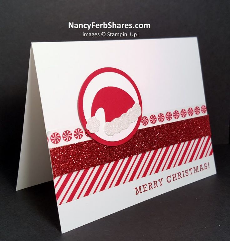 a christmas card with santa's hat on it