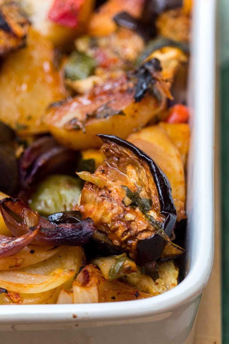 a casserole dish with roasted vegetables in it