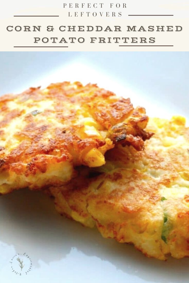 two corn and cheddar mashed potato fritters on a white plate