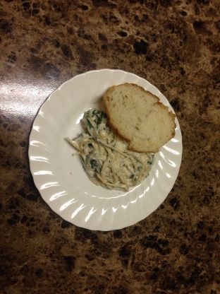 a white plate topped with food on top of a table