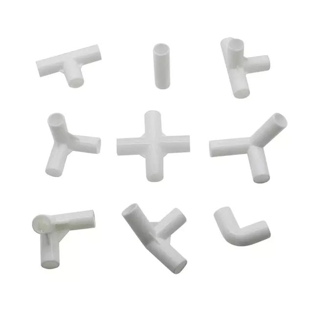 white plastic parts are arranged on a white background