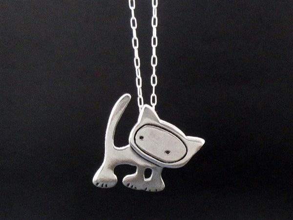 Sterling Silver Cat NecklaceThis cat is ready to rock! He measures an inch tall and is handmade using solid sterling silver. The charm comes with a 16 - 20 inch adjustable sterling silver chain. Each item comes in a cute box ready for gift giving, without a receipt. If you'd like to include a gift message, let me know at checkout. Items are shipped USPS First Class. Shipping upgrades available at checkout. Punk Cat, Punk Cats, Silver Cat Pendant, Cat Necklace Silver, Sterling Silver Charm Necklace, Sterling Silver Cat, Cat Pendant, Charm Necklace Silver, Silver Cat