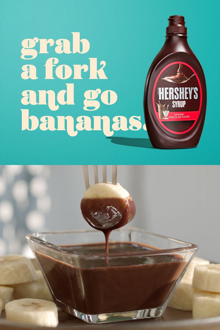 a bottle of hershey's syrup being drizzled with chocolate and bananas