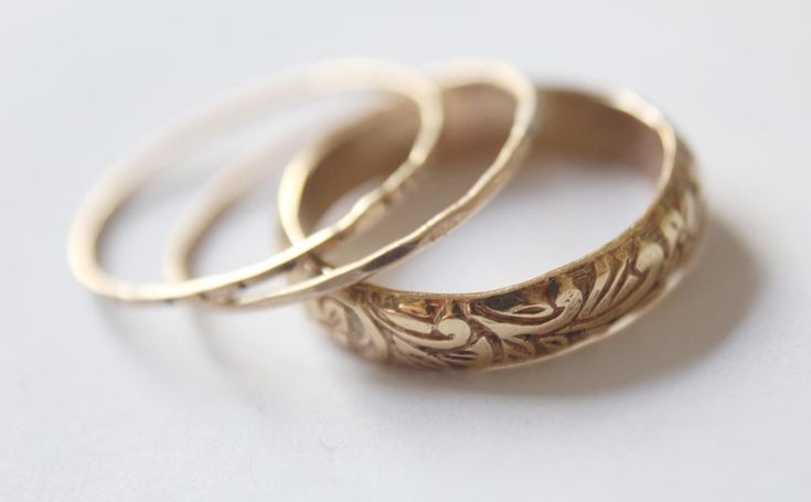 Handmade floral wedding / engagement wide band in 14k gold-filled. Handmade in your customized size. It can be worn alone, or as a part of an engagement / wedding stackable set.  Set of 3  1xfloral pattern 14k gold-filled band 1xlightly hammered 14k gold-filled ring 1xnotched 14k gold-filled ring Available in *925 sterling silver *14k Gold-filled Ornate Gold Jewelry With Decorative Band, Heirloom Etched Jewelry For Wedding, Etched Gold Round Bands, Heirloom Etched Wedding Jewelry, 14k Gold Jewelry With Intricate Design For Marriage, Elegant Etched Jewelry For Marriage, Rose Gold Brass Wedding Ring, Heirloom Etched Jewelry For Marriage, Yellow Gold Brass Wedding Jewelry