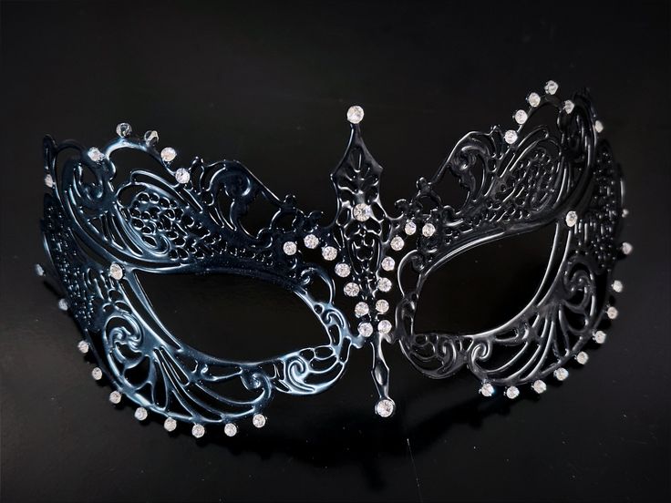 This captivating set includes two stunning masks, both designed in the classic Venetian style. The mask is adorned with sparkling rhinestones, reflecting the light and adding a touch of enchantment to her look while the black mask includes shimmer and exudes strength and sophistication, making him a charismatic presence at any masquerade or other special events.


Age Group/Gender - Adult/Unisex

Size/Type - One size fits all adults

Mask Color - Black
Mask Material - Metal women's, polyresin me Elegant Adjustable Masquerade Mask, Black Adjustable Masquerade Mask For Party, Adjustable Black Masquerade Mask For Parties, Elegant Black Mask For Costume Party, Elegant Adjustable Masks For Party, Elegant Black Masquerade Mask For Halloween, Elegant Black Masks And Prosthetics For Party, Elegant Black Party Masks And Prosthetics, Elegant Black Masks And Prosthetics For Evening