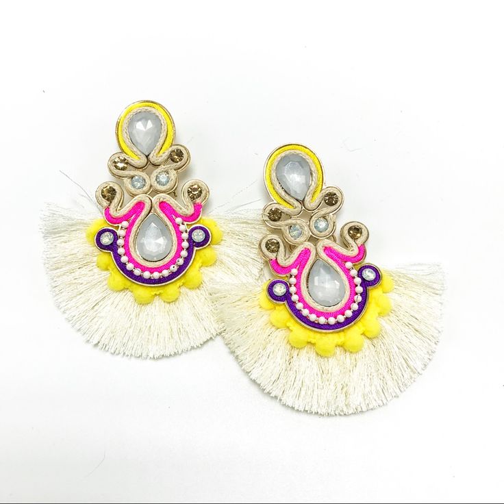 Neon Crystal Teardrop Tassel Fringe Earrings (E4) Neon Crystal Fans!! Crystal Teardrop Tassel Fringe Earrings Size : 2.25" X 3.5" Post Back Imported Sku:9012.99060 White Tassel Earrings With Latkans As Gift, White Tassel Earrings With Latkans For Gift, White Beaded Tassel Earrings For Beach, White Dangle Tassel Earrings With Latkans, White Tassel Earrings Gift, Gift White Tassel Earrings, White Tassel Chandelier Drop Earrings, White Beaded Tassel Drop Earrings, White Chandelier Drop Earrings With Latkans