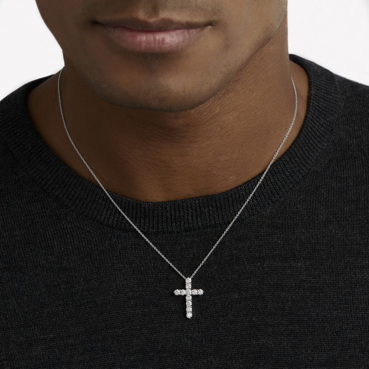 A precious interpretation of a classic motif, our small cross pendant in white gold is available in a variety of different carat weights, seen here with 0.10 carat diamonds. Deftly suspended from a white gold chain, each diamond is embraced by a minimal metal setting, optimising their brilliance and presence. The Classic Graff collection celebrates the purity and fire of the finest Graff diamonds showcased in truly timeless jewels and eternally elegant silhouettes. A precious interpretation of a White Gold Cross Necklace With Brilliant Cut Cubic Zirconia, Classic Sterling Silver Cross Necklace With Diamond Cut, White Gold Cross Necklace With Diamond Cut Cubic Zirconia, White Gold Cubic Zirconia Cross Necklace With Diamond Cut, White Gold Cross Necklace With Cubic Zirconia, Classic Diamond Cut Cross Necklace In White Gold, Diamond Cut White Gold Cross Necklace, Classic White Diamond Cut Cross Necklace, White Gold Cross Necklace With Diamond Accents