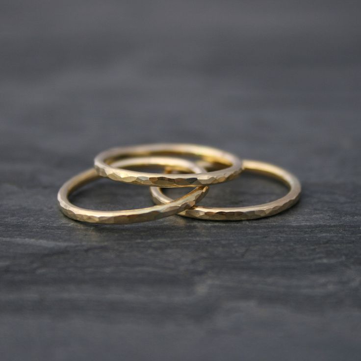 Set of Three 14k gold filled stacking rings. Each ring is hand formed and hammered creating a surface texture to catch the light. Polished to a bright shine. I use durable, high quality 14k gold-fill to make these rings. 14 karat gold-fill has a thick layer of karat gold, not just a microscopic film, as is the case with gold-plated and gold vermeil items. This set of rings will be hand made to order in your size. For more stacking rings: https://www.etsy.com/shop/KiraFerrer/search?search_query=s Rings Stack, Set Of Rings, Ring Bands, Hammered Rings, Gold Filled Ring, Stackable Rings, Stacking Rings, Handmade Ring, Gold Vermeil