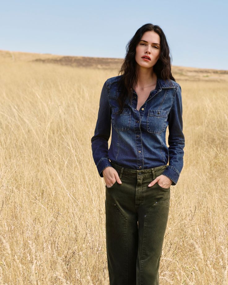 Devika is the classic denim shirt you’ll be reaching for all season long. Crafted from supremely soft denim in a vintage dark blue wash, this lightweight layer is designed with western flare seaming, elevated snap buttons, and double chest pockets. | Devika Shirt - Belinda Blue | Size Small Indigo Button-up Denim Top For Fall, Dark Wash Button-up Jeans, Fall Washed Denim Workwear Top, Spring Workwear Shirt In Dark Wash, Dark Wash Relaxed Fit Shirt For Fall, Spring Dark Wash Shirt For Work, Dark Wash Denim Shirt For Work, Relaxed Fit Dark Wash Shirt For Fall, Spring Workwear Dark Wash Shirt