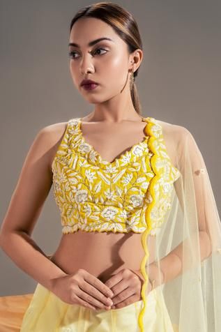 Shop for Shloka Sudhakar Yellow Suede Floral Embroidered Lehenga Set for Women Online at Aza Fashions V Neck Lehenga, Scallop Dupatta, Cutwork Blouse, Scallop Border, Yellow Lehenga, Embroidered Motifs, Embroidered Lehenga, Net Dupatta, Pastel Yellow