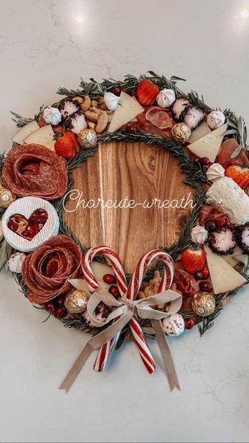 a christmas wreath with candy, candies and pretzels