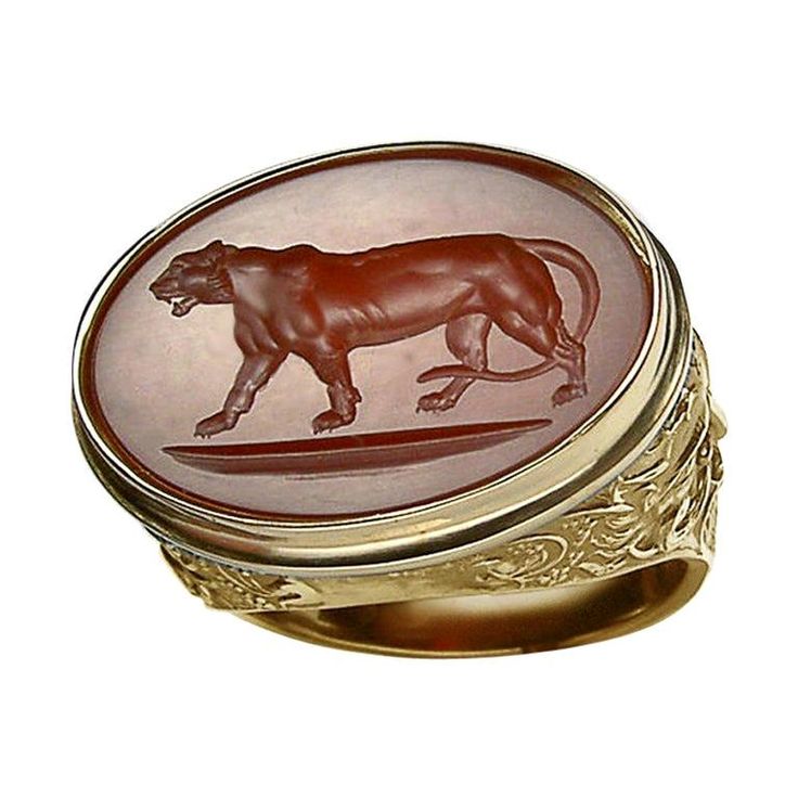 This exquisite intaglio is masterfully engraved onto rich carnelian gemstone and features a fierce tigress motif. The stone is set in an 18K signet ring. Production time for this piece is up to 12-14 weeks. Can be made in any size ranging from 6-12. Chavdar Chushev is an artist, restorer, jeweler, and master of the ancient art of gem carving. His extensive knowledge of gemstones and precious metals is complimented by a familiarity with more unusual materials, such as exotic woods, organic gems, Gem Carving, Ancient Roman Jewelry, Elizabeth Locke, Roman Jewelry, Ancient Jewellery, Art Ancien, Silver Signet Ring, Gold Signet Ring, Ancient Art