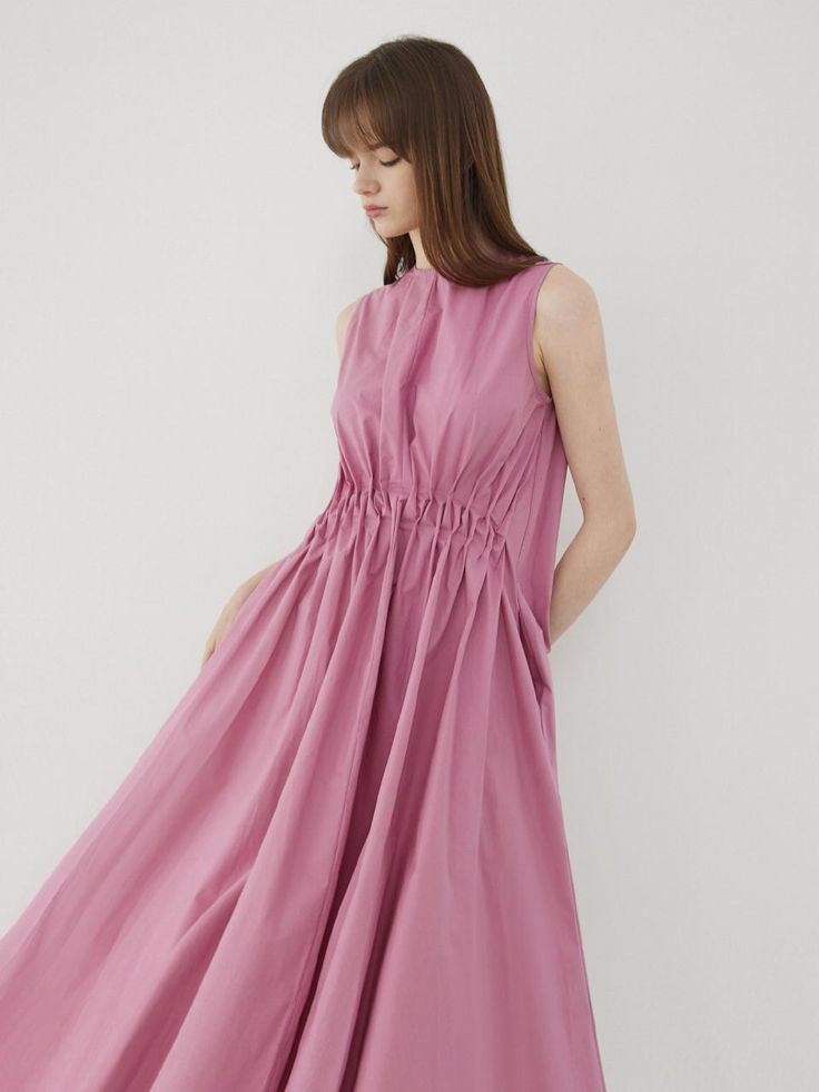 This lovely dress features voluminous, drapery silhouette in maxi length. It is accentuated with unique shirred details at waist.  - Intended for a loose fit- Lightweight cotton fabric- Airy, crisp texture- Casual side pockets and back zip fastenings- Cute and feminine feel Pre-draped Maxi Dress With Folds, Spring Pleated Pre-draped Midi Dress, Spring Billowy Ruched Maxi Dress, Billowy Ruched Maxi Dress For Spring, Midi Dress With Gathered Waist, Chic Dress With Gathered Waist And Voluminous Skirt, Chic Ruched Midi Dress With Voluminous Skirt, Summer Dress With Pleated Waist And Voluminous Skirt, Summer Midi Dress With Pleated Waist And Voluminous Skirt