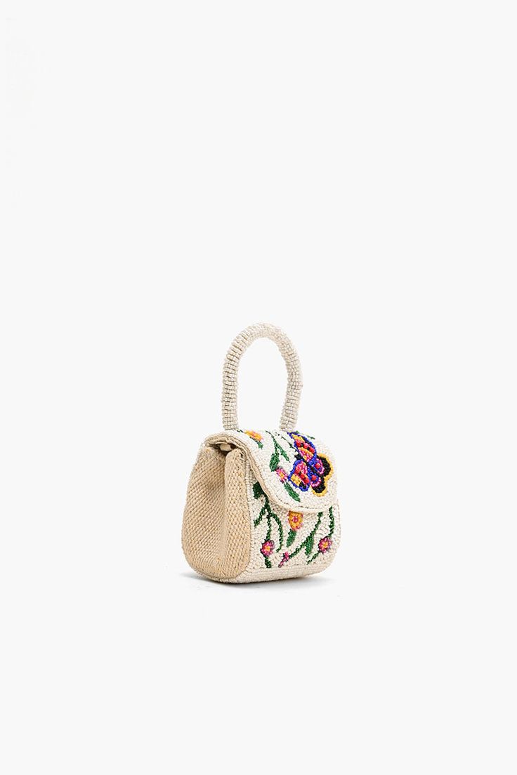 Embrace the joy of everyday adventures with our Little Flower Fun Mini Bag—an enchanting accessory designed to infuse your style with a burst of playful elegance. This mini bag is a celebration of floral charm, offering a delightful combination of whimsy and sophistication. Mini Clutch Magnetic Flap Closure Fully Beaded Front and Back Round Beaded Handle Made in Cotton Size : 3.5" x 3" x 2.5" Spring Gift Rectangular Satchel, Chic Small Bags With Removable Pouch, Chic Small Bag With Removable Pouch, Handmade Flower-shaped Bags For Spring, Handmade Flower-shaped Spring Bags, Handmade Spring Flower-shaped Bags, Multicolor Floral Print Top Handle Bag, Spring Gift Bag With Detachable Handle, Summer Gift Bag With Detachable Handle