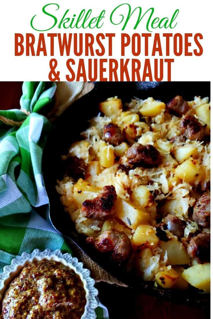 a skillet filled with bratwurst potatoes and sauerkraut next to a pie