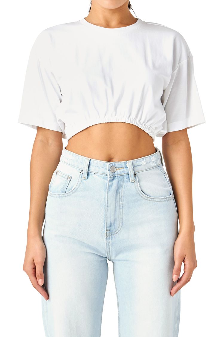 Top your high-waist styles with this staple cropped T-shirt crafted from pure cotton with a stretch elastic hem. Crewneck Short sleeves Lined 100% cotton with 93% polyester, 7% spandex contrast Hand wash, dry flat Imported Cotton Cropped Hem T-shirt For Summer, White Crew Neck Cotton Crop Top, White Cotton Crew Neck Crop Top, Basic White Cotton Crop Top, White Relaxed Fit Crop Top With Cropped Hem, White Relaxed Fit Crop Top, White Stretch Cropped Shirt, White Casual Cotton Cropped Shirt, Casual White Cotton Cropped Shirt