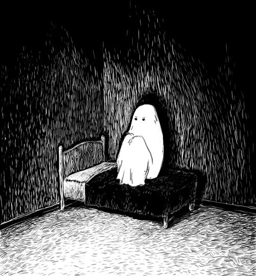 a ghost sitting on a bed in a dark room