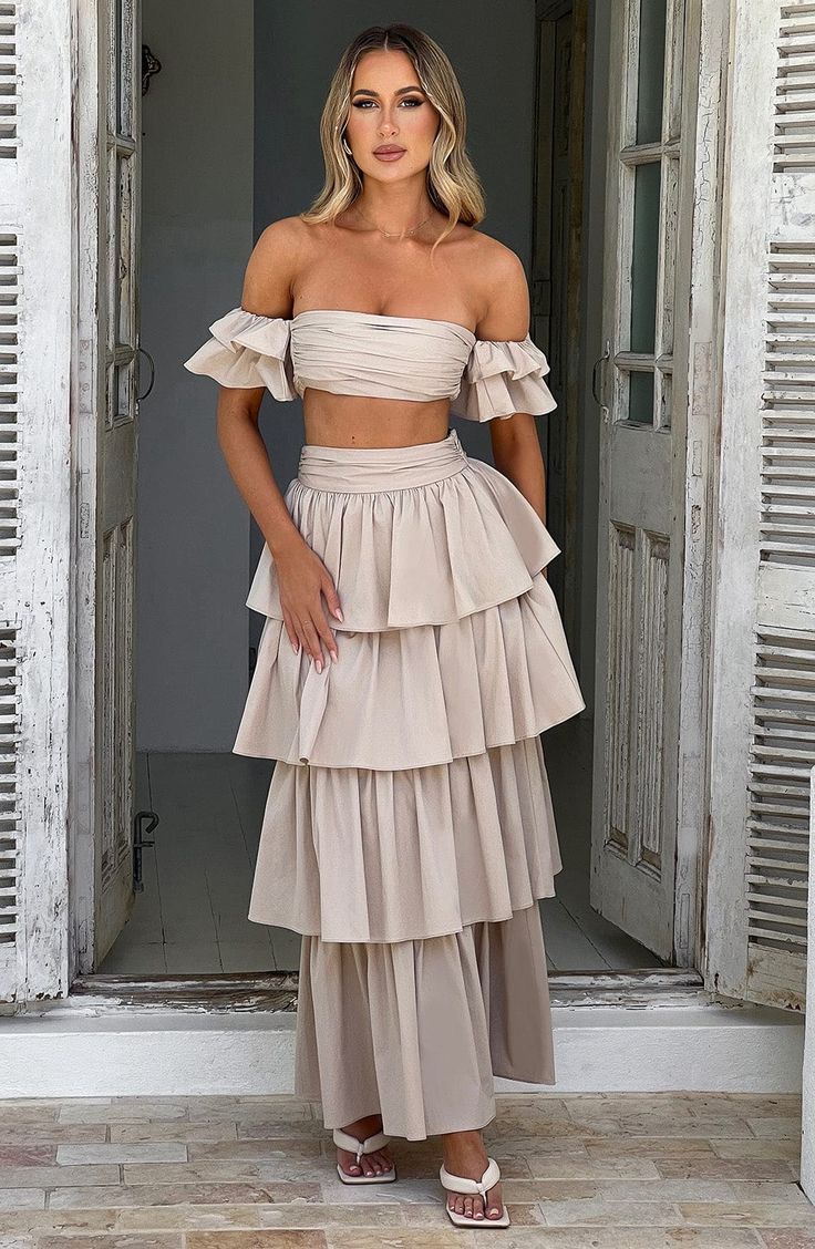 Cut from crisp, premium cotton, the Joy set is a vision. This super feminine, pretty skirt is maxi length with layers of ruffles and a cinched high waist. 



Colour: Beige.

Premium cotton fabric.

Cinched high waist.

Ruffle detail.

Maxi length.

Model is an XS and is wearing an XS.

 Size: XS, S, M, L, XL, XXL Homecoming Dresses Corset, White Dress Spring, Midi Dress Wedding Guest, Long Sleeve Homecoming Dresses, Pretty Skirt, Split Long Dress, Pretty Skirts, Homecoming Dresses Long, Maxi Dress Sale