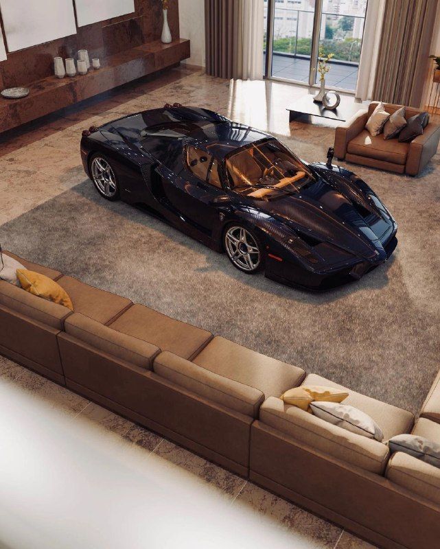 a black sports car sitting in the middle of a living room