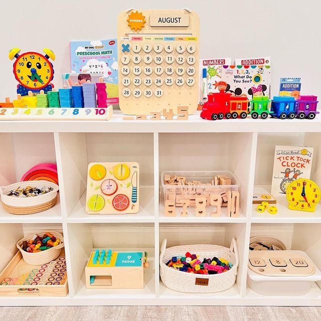 a shelf filled with lots of toys and books