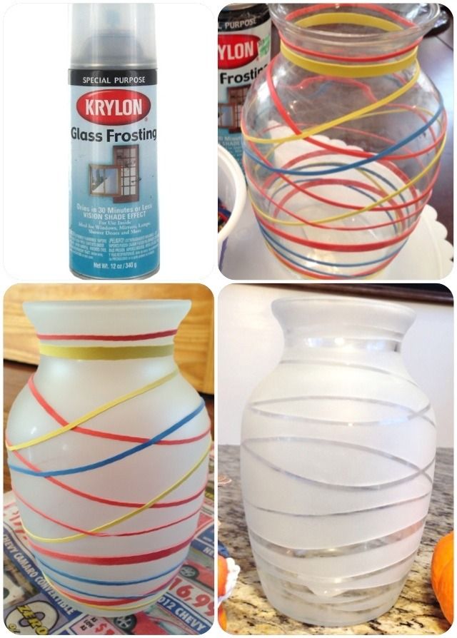 four different types of glass vases with colored ribbons in them and one is empty