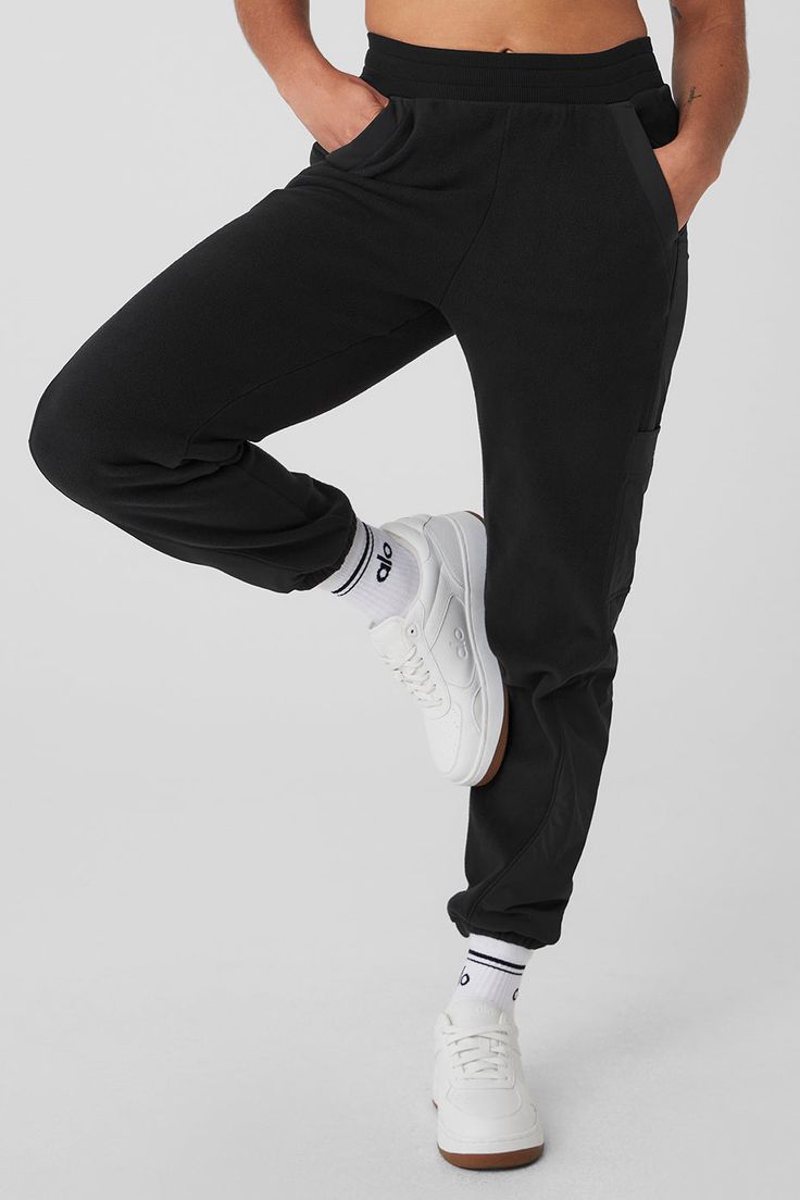 Made from a fleecy-soft fabric with smooth, contrasting panels down the legs, these pants are every bit as cozy as they look. They have a total of 4 pockets—2 on the sides, 2 on the legs—plus a stretchy high-rise waistband and stretchy cuffed hems for a jogger-style fit. Our advice? Get the matching jacket, too. Alo Yoga Sporty Loungewear Bottoms, Sporty Cotton Bottoms By Alo Yoga, Comfortable Cotton Bottoms By Alo Yoga, Comfortable Cotton Alo Yoga Bottoms, Casual Full-length Alo Yoga Pants, Comfortable Alo Yoga Cotton Bottoms, Comfortable Alo Yoga Bottoms With Elastic Waistband, Alo Yoga Athleisure Loungewear Bottoms, Alo Yoga Athleisure Bottoms For Loungewear