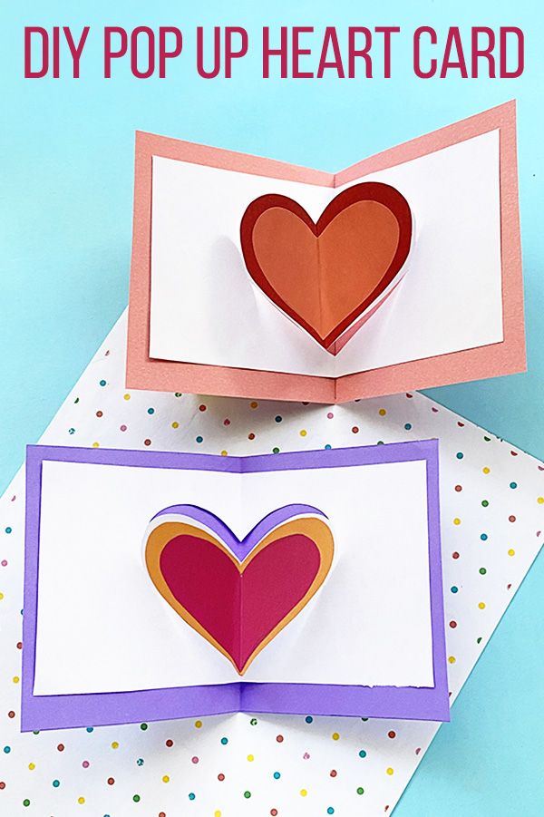 two folded cards with hearts on them and the words diy pop up heart card