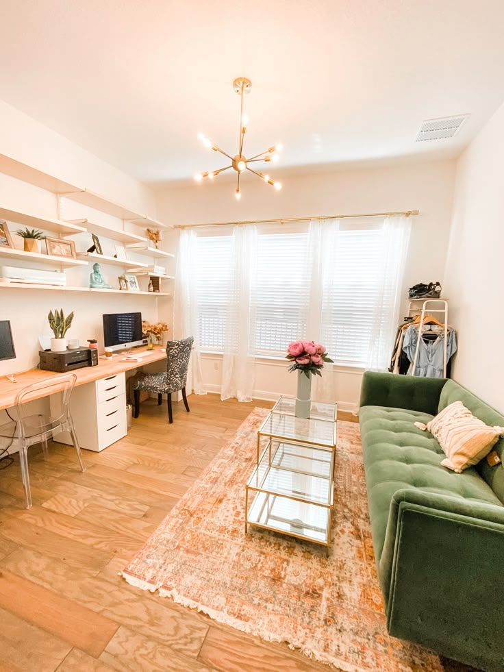 a living room filled with furniture and a flat screen tv