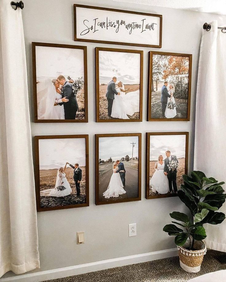 a couple's wedding pictures are hung on the wall