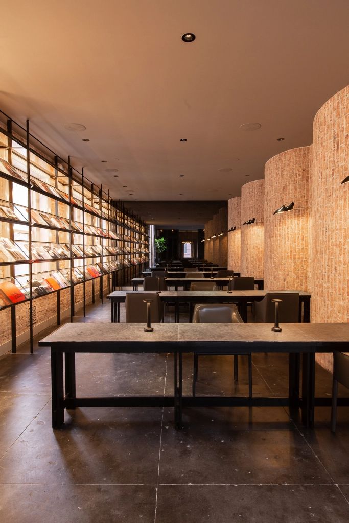 an empty restaurant with tables and chairs