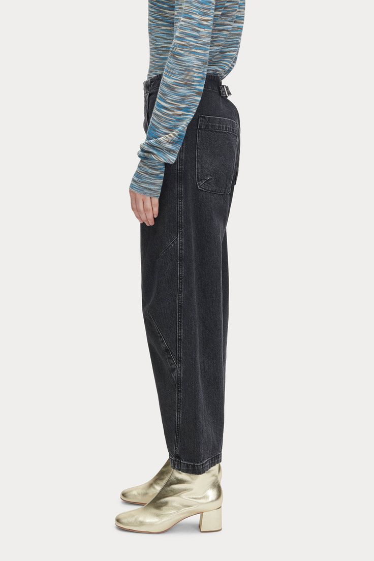 The Elkin Pant is one of our all-time favorites, cut this season in our Washed Salinas Denim, a faded black Japanese denim with subtle distressing that opens up and softens with wear. This style can sit at the lower waist, on your hips, or tighten the back strap to wear higher at your natural waist. Angled darts give t Black Rigid Denim Cropped Bottoms, Black Rigid Denim Cropped Leg Bottoms, Black Cropped Leg Rigid Denim Bottoms, Washed Black Rigid Denim Jeans, Wide Leg Jeans In Washed Black With Belt Loops, Washed Black Cropped Leg Pants With Five Pockets, Washed Black Straight Leg Jeans, Edgy Washed Black Jeans, Washed Black High Waist Jeans With Five Pockets