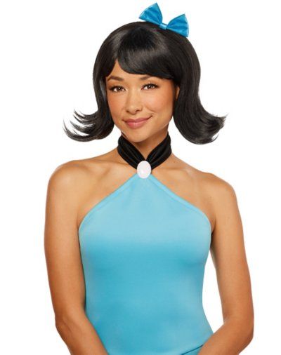 a woman wearing a blue swimsuit with a bow on her head and black hair