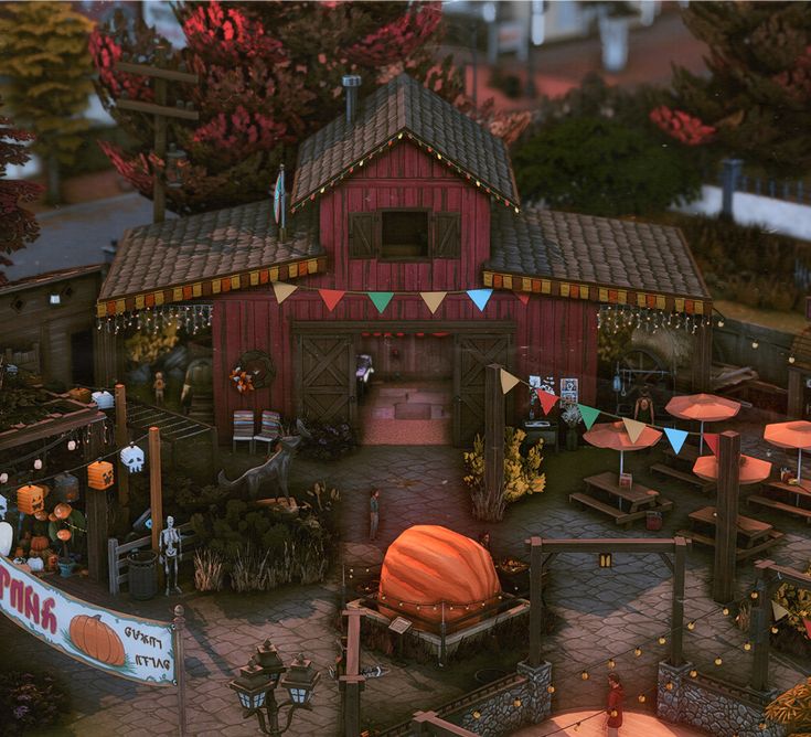 an aerial view of a small farm with lots of pumpkins and other things in the yard